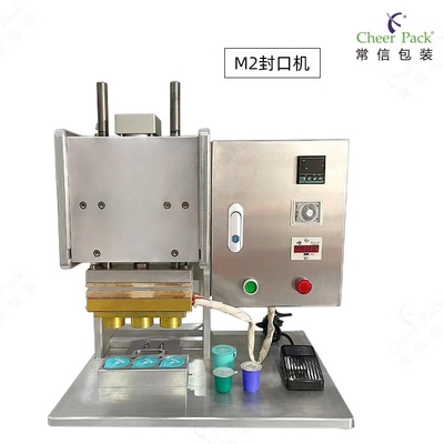 Máy niêm phong nhiệt bán tự động nhỏ cho túi đứng đứng và ly viên nang