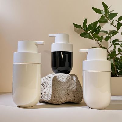 chai mỡ hình tròn PET mỹ phẩm với máy bơm báo chí và tùy chỉnh màu sắc in màn hình lụa cho bao bì làm đẹp