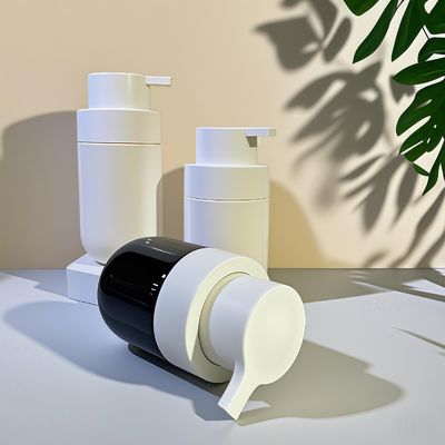 chai mỡ hình tròn PET mỹ phẩm với máy bơm báo chí và tùy chỉnh màu sắc in màn hình lụa cho bao bì làm đẹp